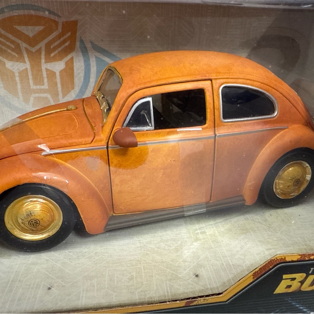 Classic Orange and Gold Toy Car